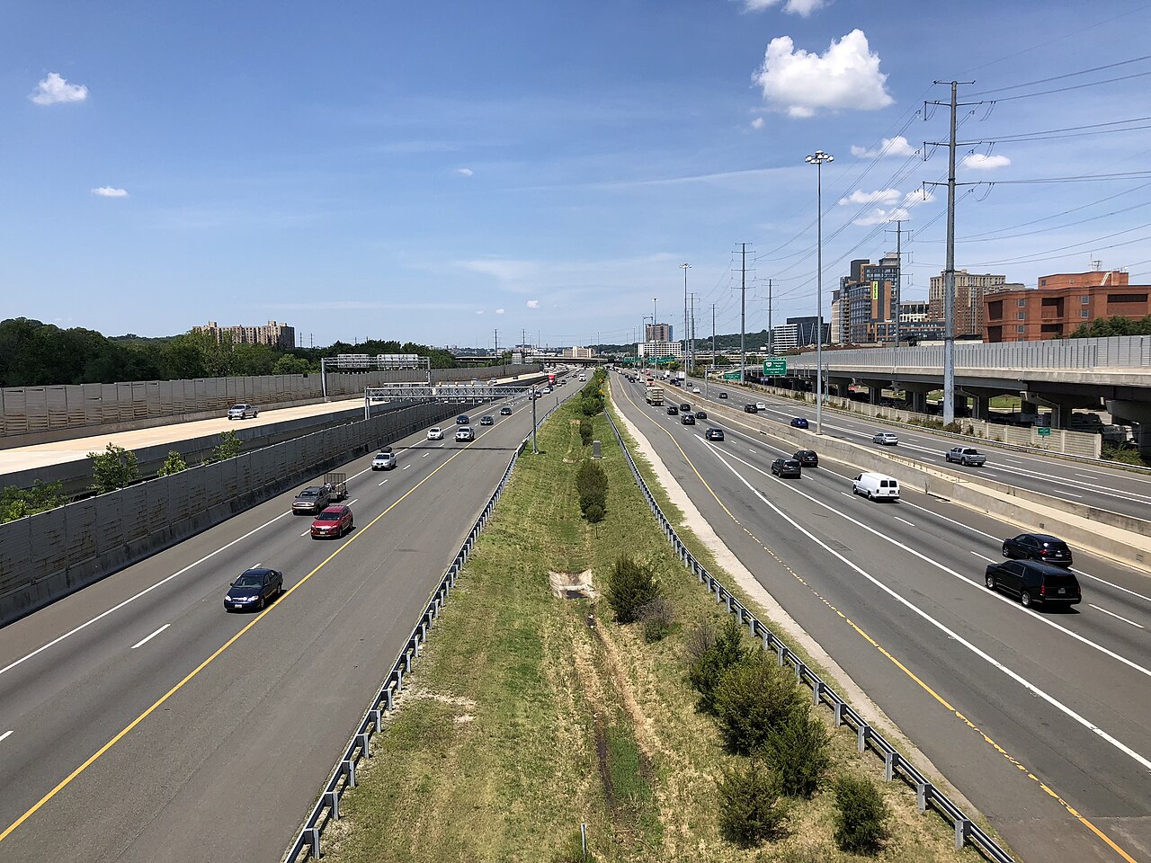 View south along Interstate 95 and west along Interstate 495 (Capital Beltway) from the overpass for the ramp connecting Mill Road to Interstate 95 northbound and Interstate 495 eastbound in Alexandria, Virginia