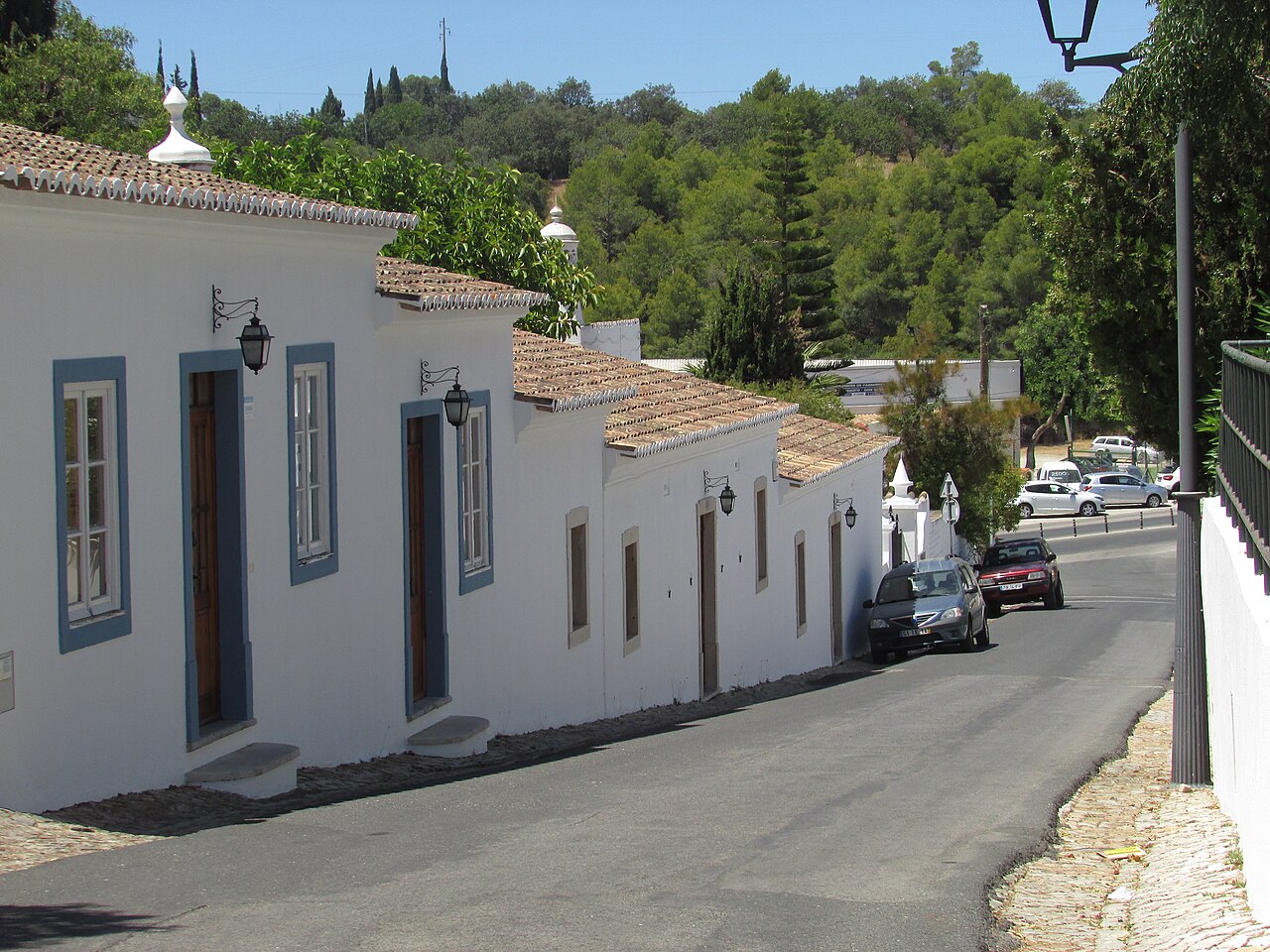 Looking westwards along the Rua da Igreja in the town of Almancil, Algarve, Portugal.