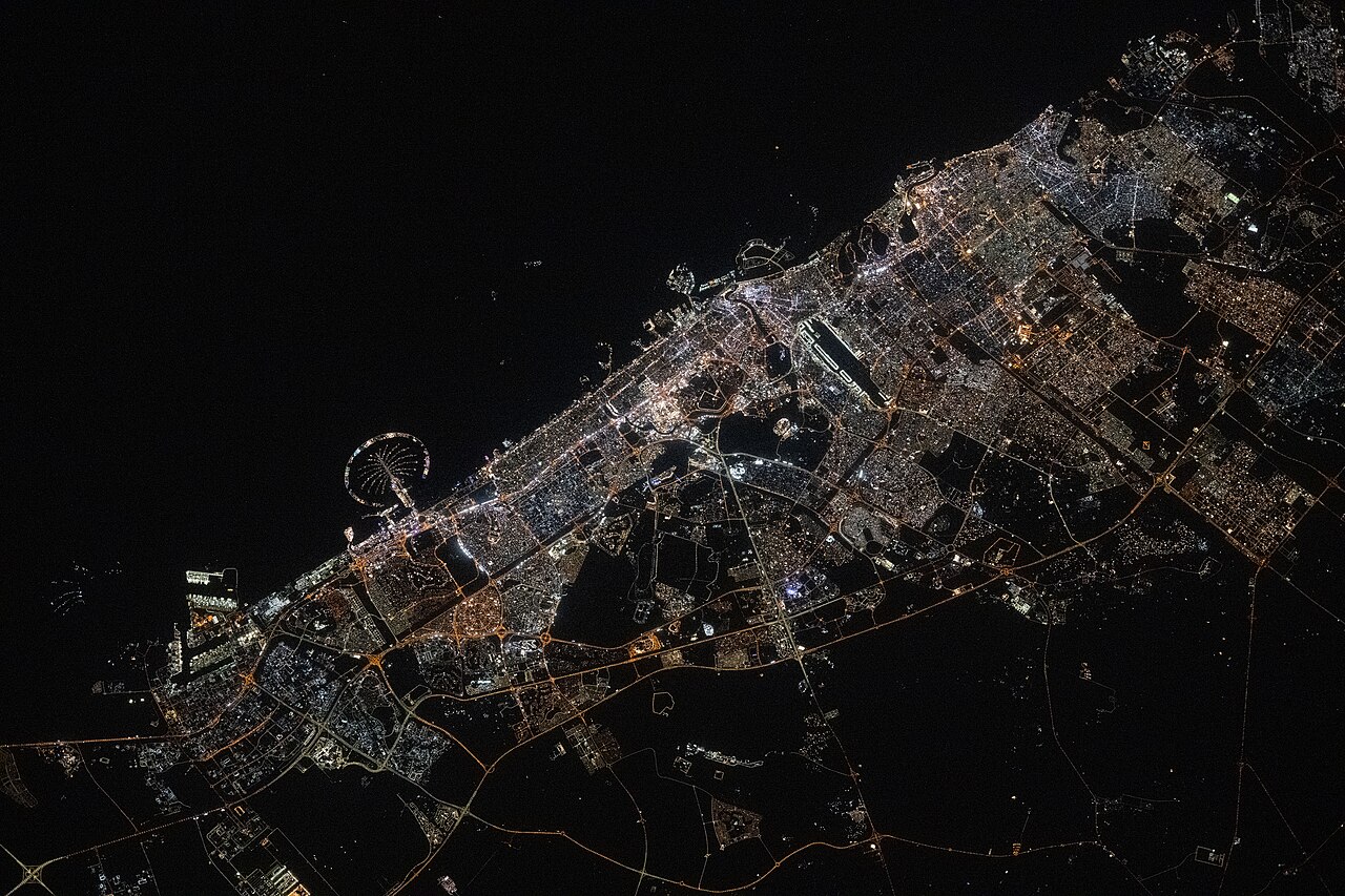 iss073e0134584 (May 22, 2025) --- Dubai, the United Arab Emirates' largest city with a population af 3.94 million on the Persian Gulf coast, is pictured at approximately 11:44 p.m. local time from the International Space Station as it orbited 259 miles above the Arabian Peninsula. Featured prominently at left center, is the artifical island of Palm Jumeirah.