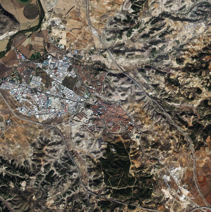 The diverse landscapes of the autonomous Community of Madrid in the heart of Spain are evident in this week’s image.
The community and country’s capital city is visible near the centre of the image. Zooming in, we can see the Buen Retiro park just east of the city centre with its large, artificial pond. About 3.5 km due north sits the Santiago Bernabéu football stadium. Southeast of the stadium we can see another circular structure: the Las Ventas bullfighting ring.
In the upper left corner of the image is the El Pardo mountain and protected natural park, which is popular for mountain biking.
The other areas surrounding Madrid are blanketed with agricultural structures. East of the city are large fields along the Jarama river, and more areas of agriculture appearing brown further east still.
This image, also featured on the Earth from Space video programme, was taken by the Sentinel-2A satellite on 16 November 2015.
Launched in June 2015, Sentinel-2 can map changes in land cover such as forest, crops, grassland, water surfaces and artificial cover like roads and buildings in cities.

Early results from the mission on mapping changes in land cover are expected to be presented at the upcoming Living Planet Symposium, held in Prague in May. The event brings together scientists and users to present their latest findings on Earth’s environment and climate derived from satellite data.