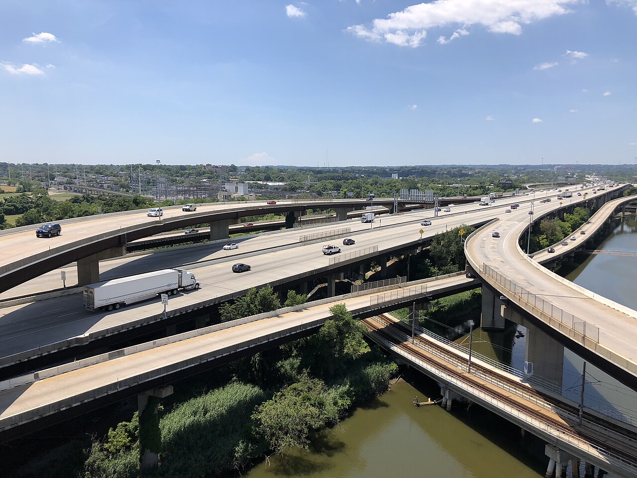 View south along Interstate 395 (Cal Ripken Way) at its junction with Interstate 95 from the overpass for the ramp from Interstate 395 southbound to Interstate 95 northbound in Baltimore City, Maryland