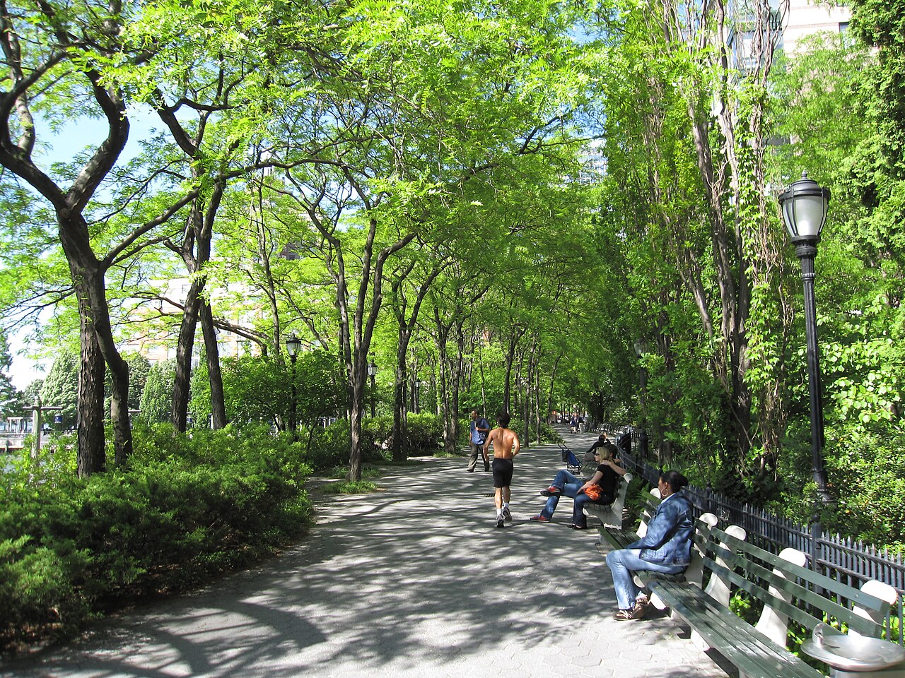 Park benches and walkway — Battery Park City.