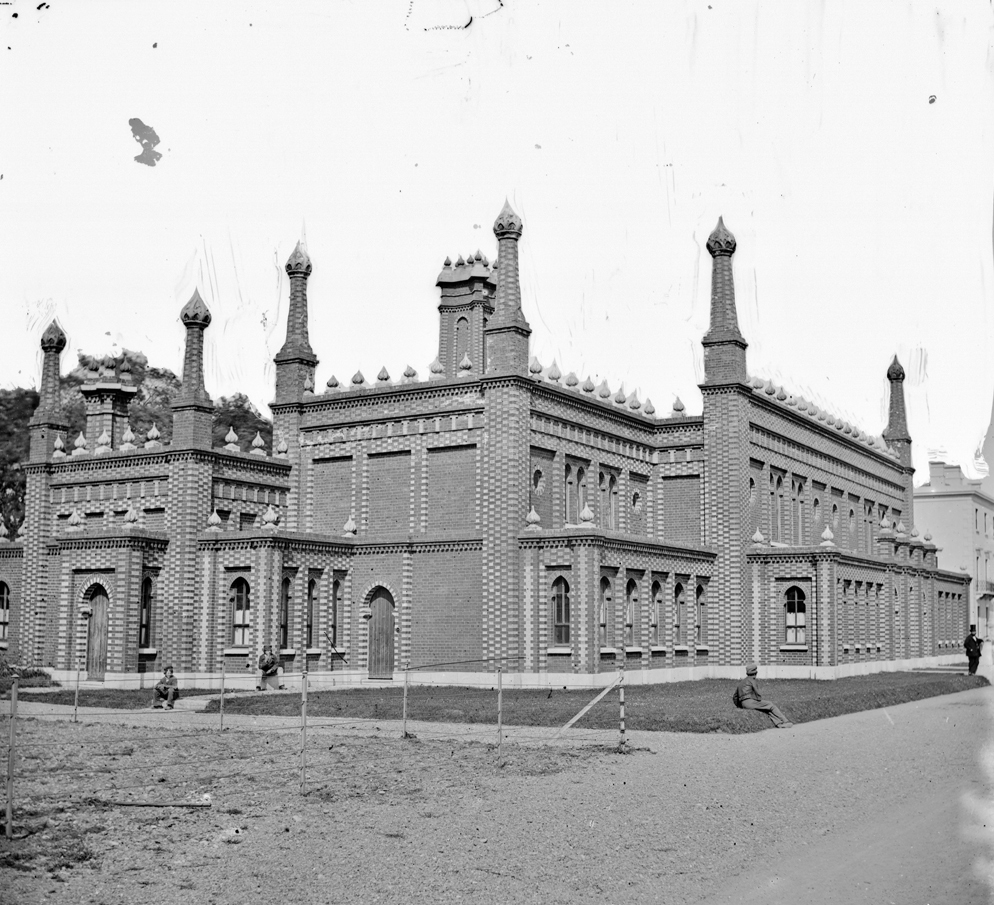 In my lifetime I must have visited Bray over 100 times, I am sad to report that I have never seen this building or anything which resembles this building.  Then again I did not think that there was a significant statue of Prince Albert still standing in Dublin....
And so we (we Marys at any rate) learned that this was the Turkish Baths in Bray County Wicklow. Per the various history links shared today, the building dates from 1859 - when there was a Victorian-era fashion for such baths. However the fad faded pretty quickly, and though this image captures the building in its original form and use, by 1867 the building was altered slightly for use as assembly rooms. It served as a cinema for a period, before becoming derelict. It was demolished in the 1980s....
Photographers:  Frederick Holland Mares, James Simonton
Contributor:  John Fortune Lawrence
Collection:  Stereo Pairs Photograph Collection
Date:  c.1860-1883. Likely c.1859-1867 (before building repurposed as assembly rooms)
NLI Ref:  STP_2915

You can also view this image, and many thousands of others, on the NLI’s catalogue at catalogue.nli.ie