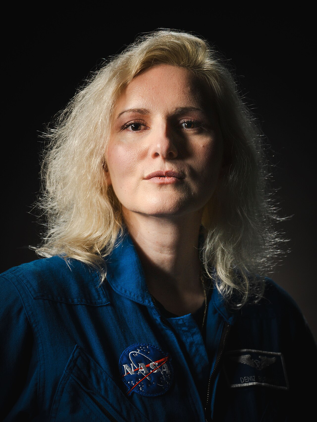 jsc2024e013685_alt (February 8, 2024) --- NASA astronaut Deniz Burnham poses for a portrait at NASA’s Johnson Space Center in Houston, Texas. Credit: NASA/ Josh Valcarcel