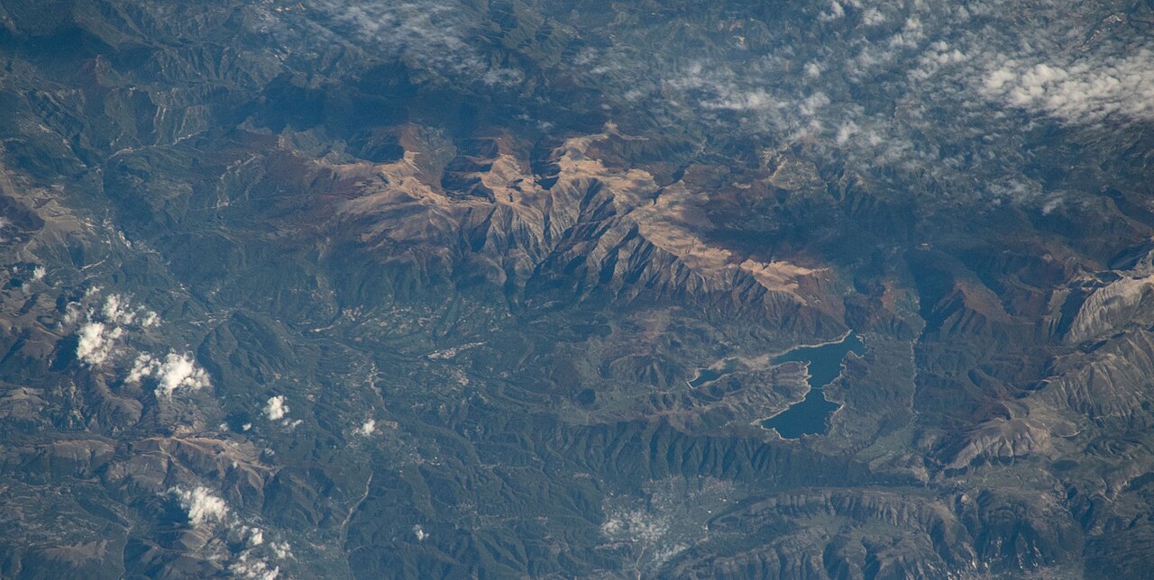 View of Italy taken during ISS Expedition 61. Monti della Laga (Cima Lepri, Monte Gorzano, Monte di Mezzo), lake Lago di Campotosto, Monte Cardito, Monte Corvo and Monte San Franco (Gran Sasso), Monte Mozzano, Amatrice, Lago di Scandarello