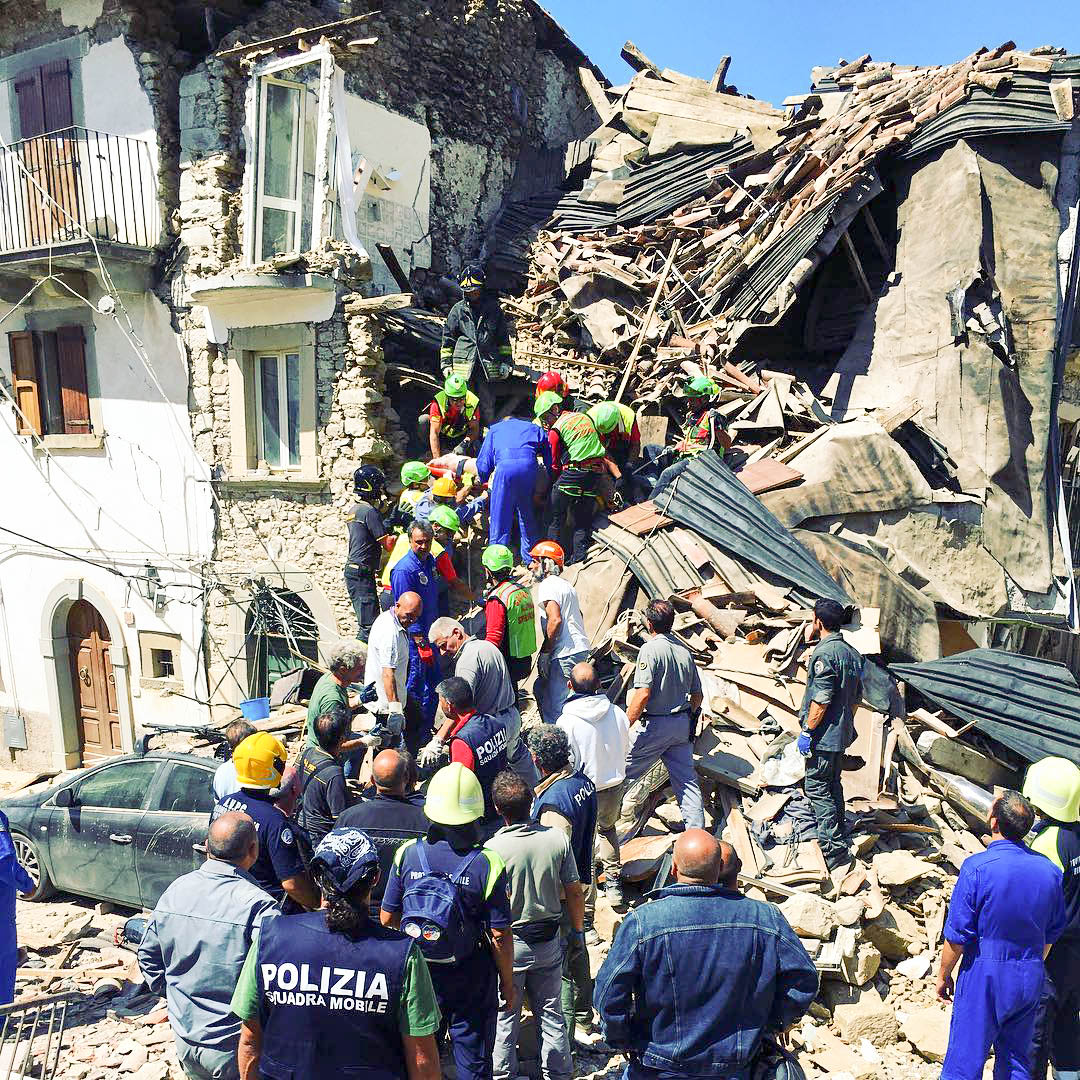 2016 Central Italy earthquake - rescuers working in Rio, village near Amatrice. A woman named Paola was pulled out alive from this house.