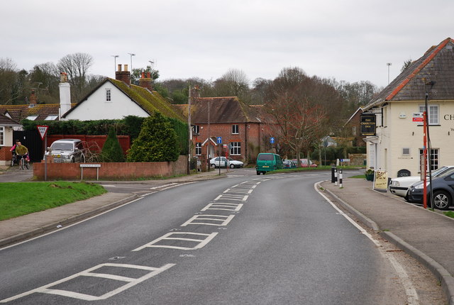 Road through Charlton Marshall Passing by the Charlton Inn, driving south to north.