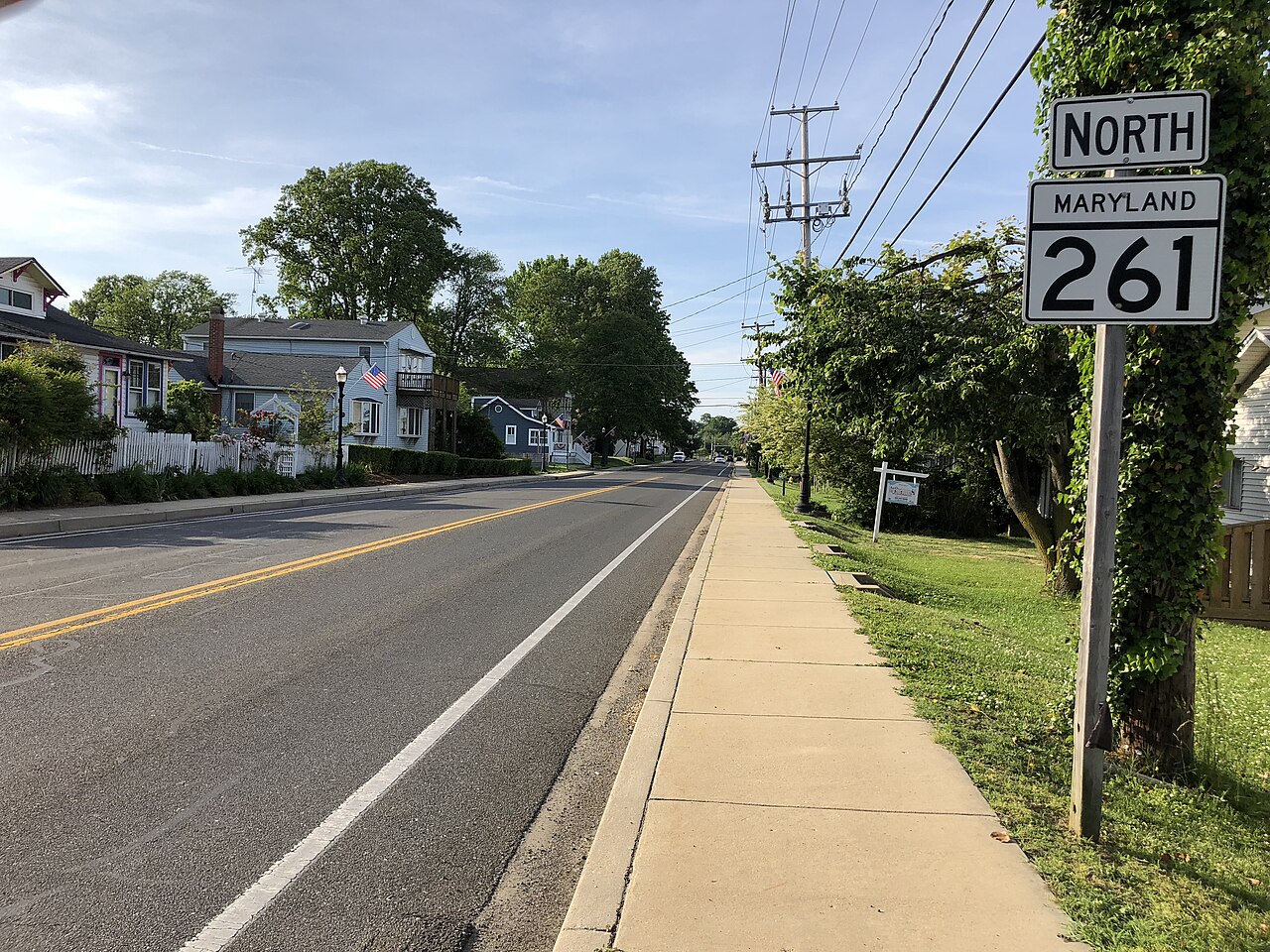 View north along Maryland State Route 261 (Bayside Road) at Maryland State Route 260 (Chesapeake Beach Road) in Chesapeake Beach, Calvert County, Maryland