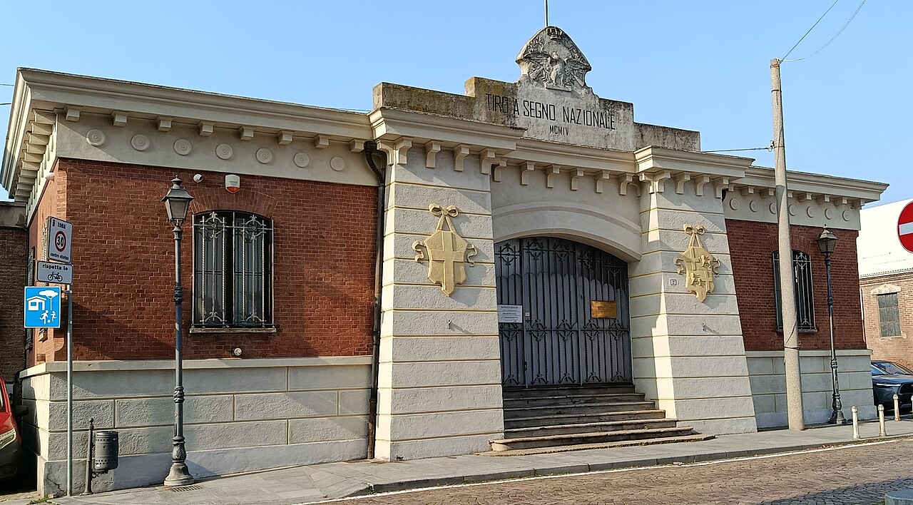 Shooting gallery building facade in Chieri, Italy