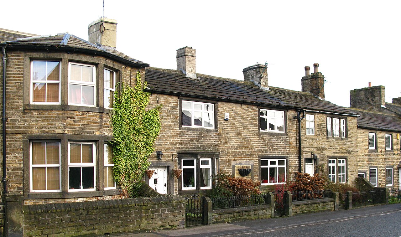 Old Post Office, Cross Hills "Post Office" is still visible on the lintel above the blocked doorway.