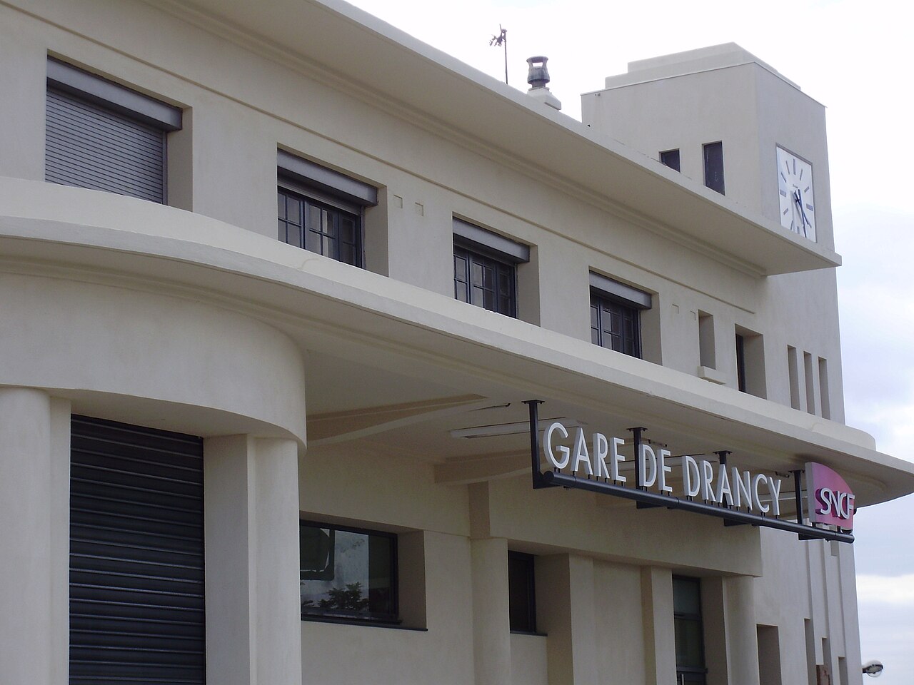 Drancy station, Seine-Saint-Denis, France (view from the place in front of the station in the north of tracks, Anatole-France street)