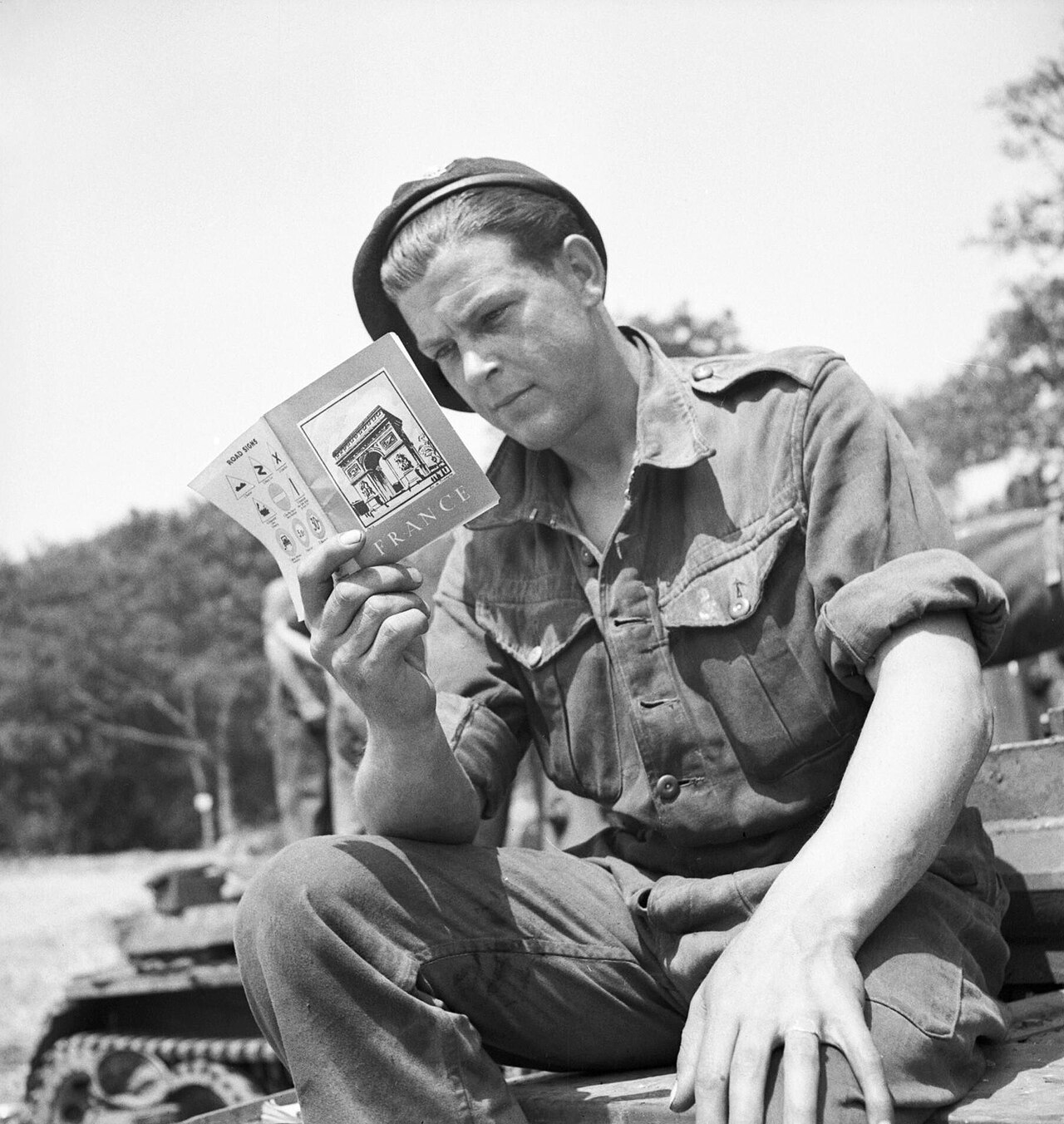 A soldier from 101st Light Anti-Aircraft Regiment prepares for D-Day by reading his French handbook at a camp near Portsmouth, 29 May 1944.
A soldier from 101st Light Anti-Aircraft Regiment (12th King's Regiment (Liverpool)) 3rd Division, prepares for D Day by reading at his French handbook at Camp A2 at Emsworth, near Portsmouth, Hampshire, 29 May 1944.