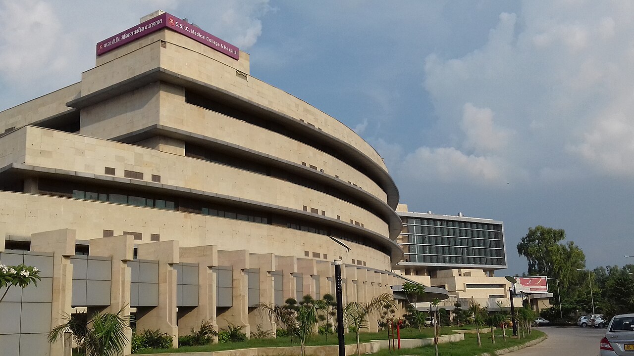 Academic Block with the Hospital in the backdrop.