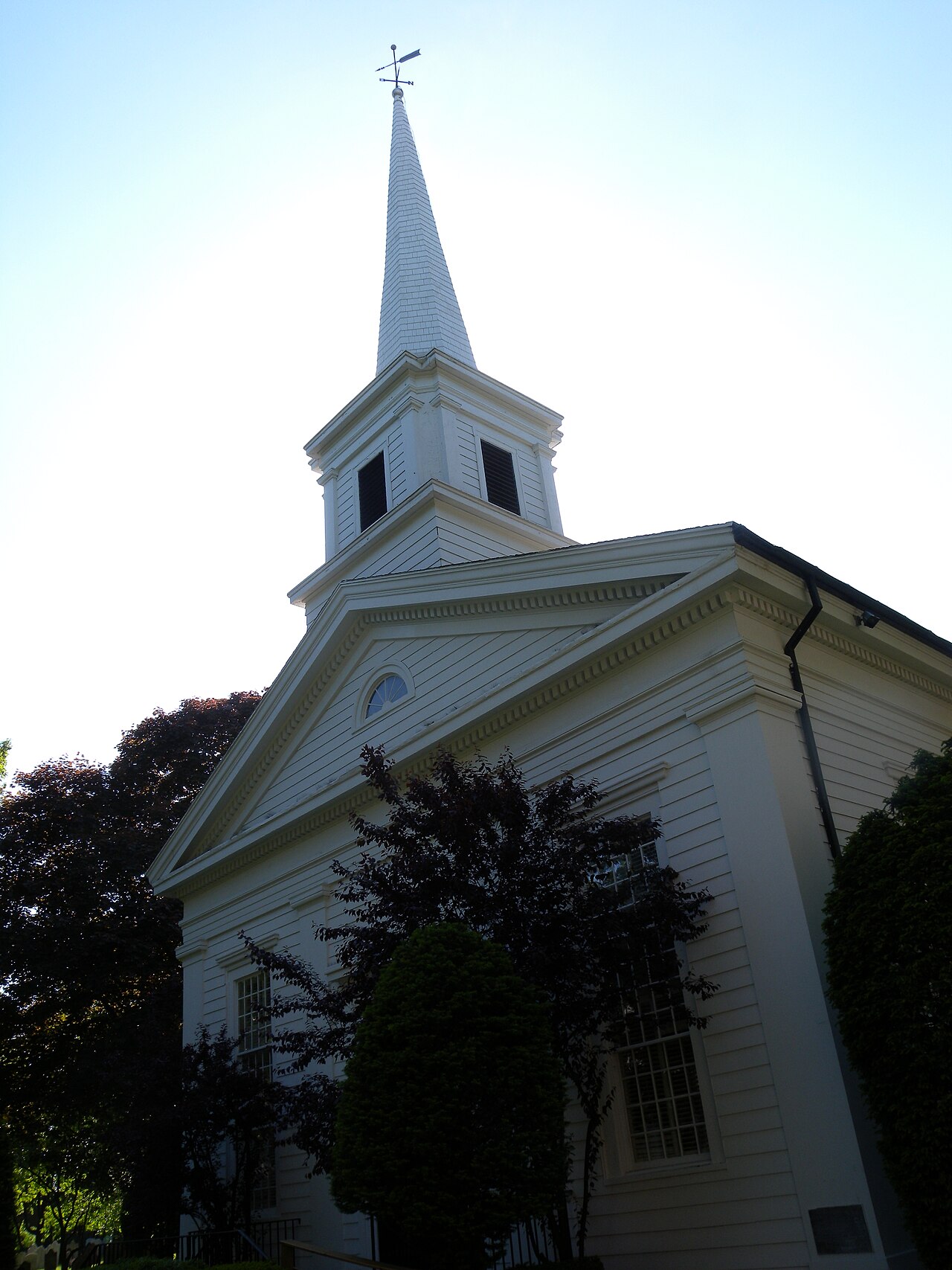 Looking west and up at steeple of Flatlands Dutch Reformed Church on a sunny afternoon.  See also File:DRC Flatlands downsun jeh.JPG