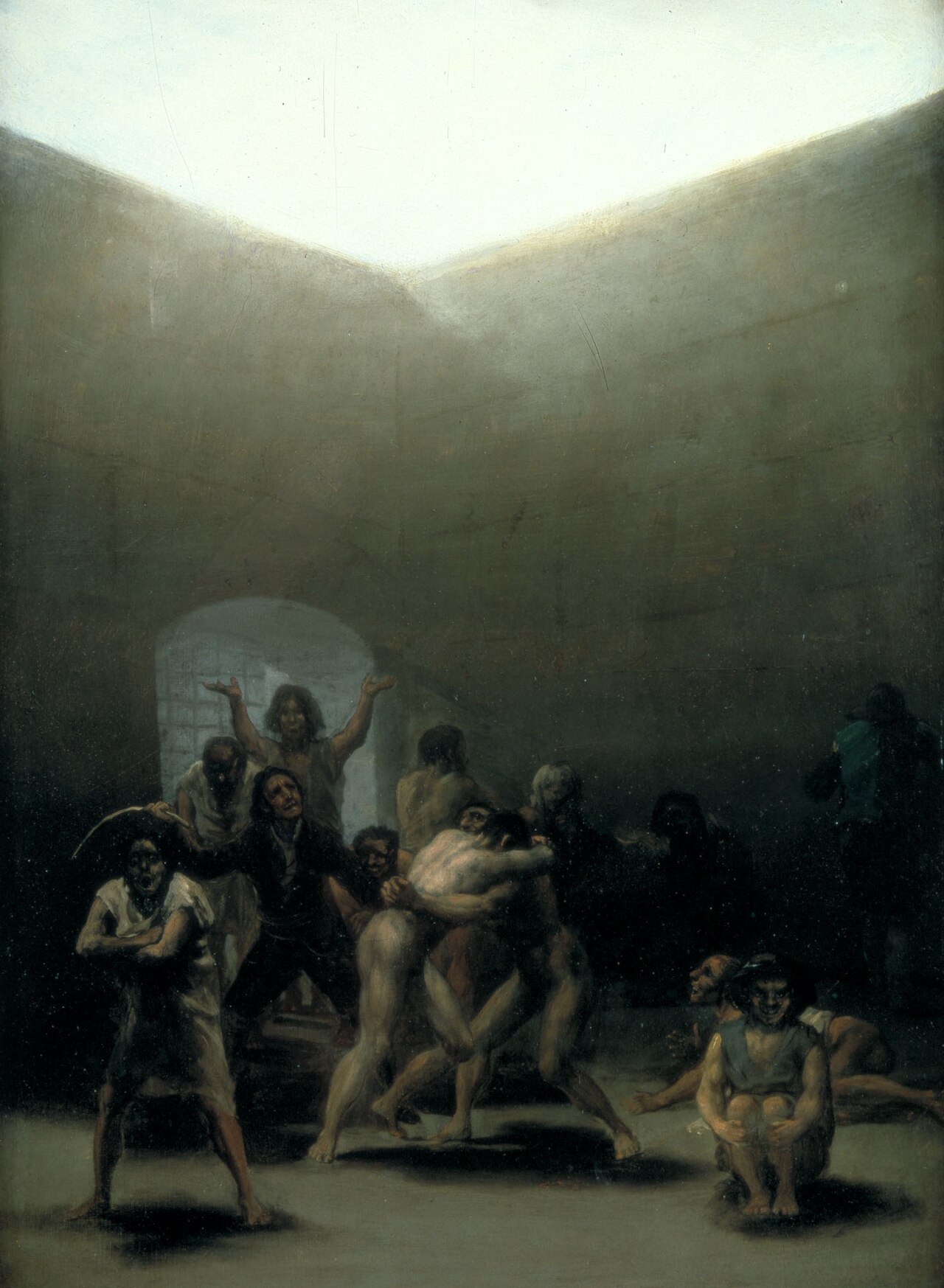 In one of his letters, Goya describes the painting: "a yard with lunatics, in which two nude men fight with their warden beating them... [it is a scene I saw in Zaragoza]."[1]