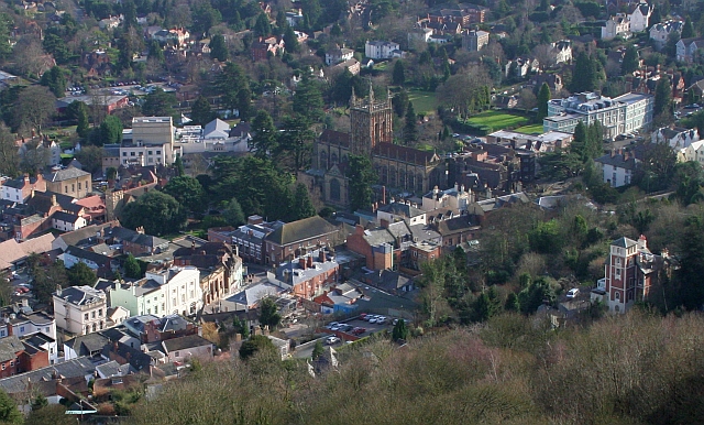 Great Malvern Town Centre Viewed from Lady Howard de Walden's Drive on the east side of North Hill. This is where the tiny village grew around the gatehouse of the priory. In the late 18th century it grew in popularity with several large houses being built along the Worcester road. When the "Water Cure" came to Malvern in the 1840s there was a rapid expansion. This in turn attracted many boarding schools to settle her. This in turn attracted the scientists who took over Malvern College during World War II. The research establishment caused further expansion and many scientific spin-off companies that makes Malvern what it is today.