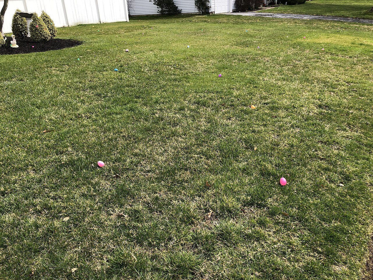 Plastic Easter eggs scattered in a lawn along Texas Avenue in the Hamilton Square section of Hamilton Township, Mercer County, New Jersey