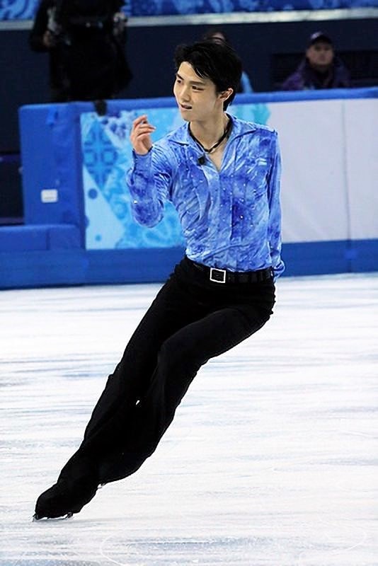 The picture shows Japanese figure skater Yuzuru Hanyu (19) in the short program at the 2014 Winter Olympics. He performs a forward inside counter turn on the right foot (RFI → RBI) as a choreographic transition.
Hanyu skates to the music piece "Parisienne Walkways" by Gary Moore, choreographed by Jeffrey Buttle. The costume is designed by Tadashi Nagashima.



Costume

This file depicts a work of costuming/cosplay of a copyrighted fictional character or real-life individual. While this file is under a free license, re-use of this file may be subject to legal constraints, depending on jurisdiction and independent from its copyright status.
Before using this content, please ensure that you have the freedom to do so under the laws which apply in the circumstances of your intended use. You are solely responsible for ensuring that you do not infringe someone else's legal rights. See our general disclaimer.