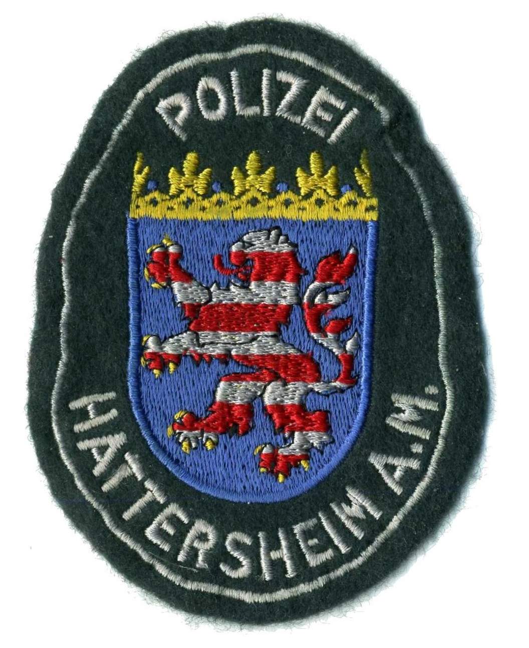 Part of my collection of GERMAN Law Enforcement insignia
This agency was absorbed in 1972 into Polizei Hessen, one of the 16 Lander (states) which make up the Federal Republic of Germany.

The German style of police patch was rationalised upon the "regionalisation" of (West) German policing in the mid-1970s. when all remaining municipal police forces were merged into the State police of the Lander - and now the patch of all State Police forces comprises the word POLIZEI above the State coat of arms.