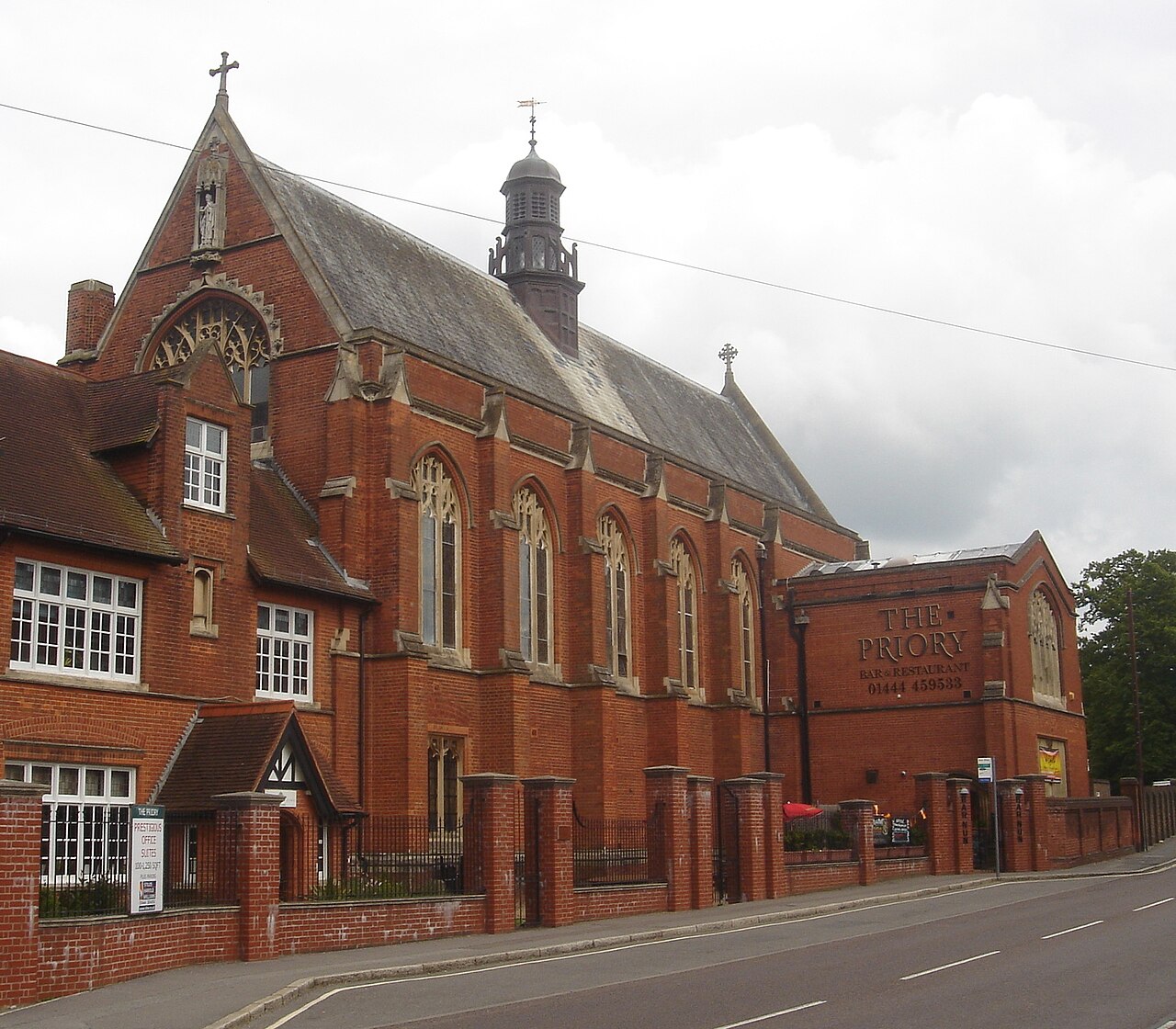 Former Priory of Our Lady of Good Counsel, Haywards Heath, District of Mid Sussex, West Sussex, England. Built 1887-88 for a community of nuns from Bruges, this building was also Haywards Heath's first Roman Catholic church. A separate church (St Paul's) was established nearby in 1930, the nuns moved to Sayers Common in 1978 and the building has been converted into a restaurant, offices and conference facilities.