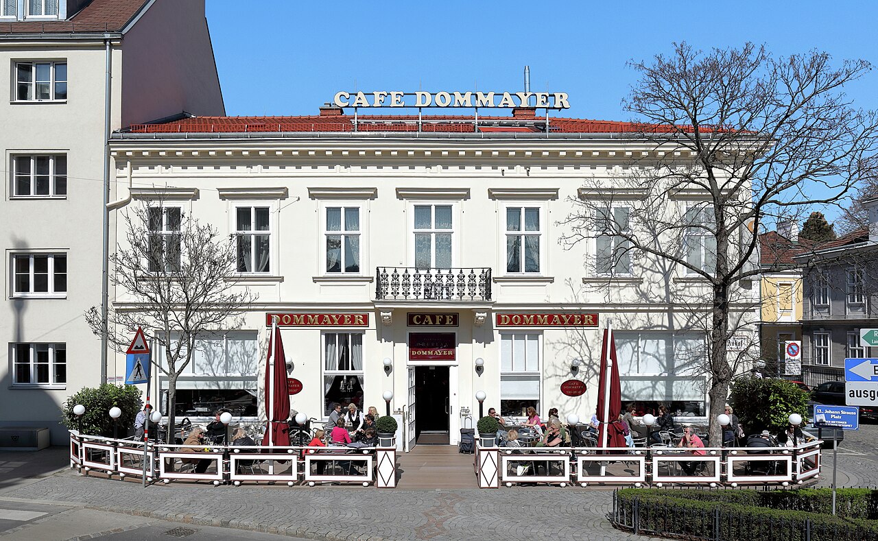 Das Café Dommayer an der Adresse Dommayergasse 1 / Auhofstraße 2 im 13. Wiener Bezirk Hietzing.In dem 1880 aufgestockten und 1924 von Franz Rienesl adaptierten Gebäude eröffnete die Cafétiersfamilie Schneider 1925 den „Dommayerhof“. Seit 1963 wird der Gastronomiebetrieb unter dem Namen „Café-Dommayer“ geführt.