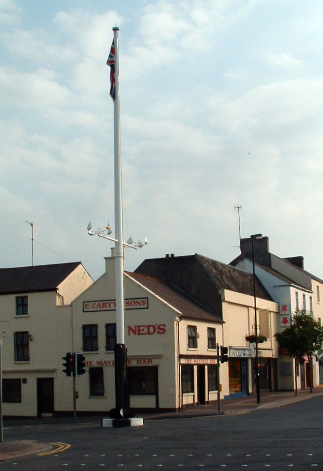 The Maypole in the centre of Holywood and Ned's Bar.