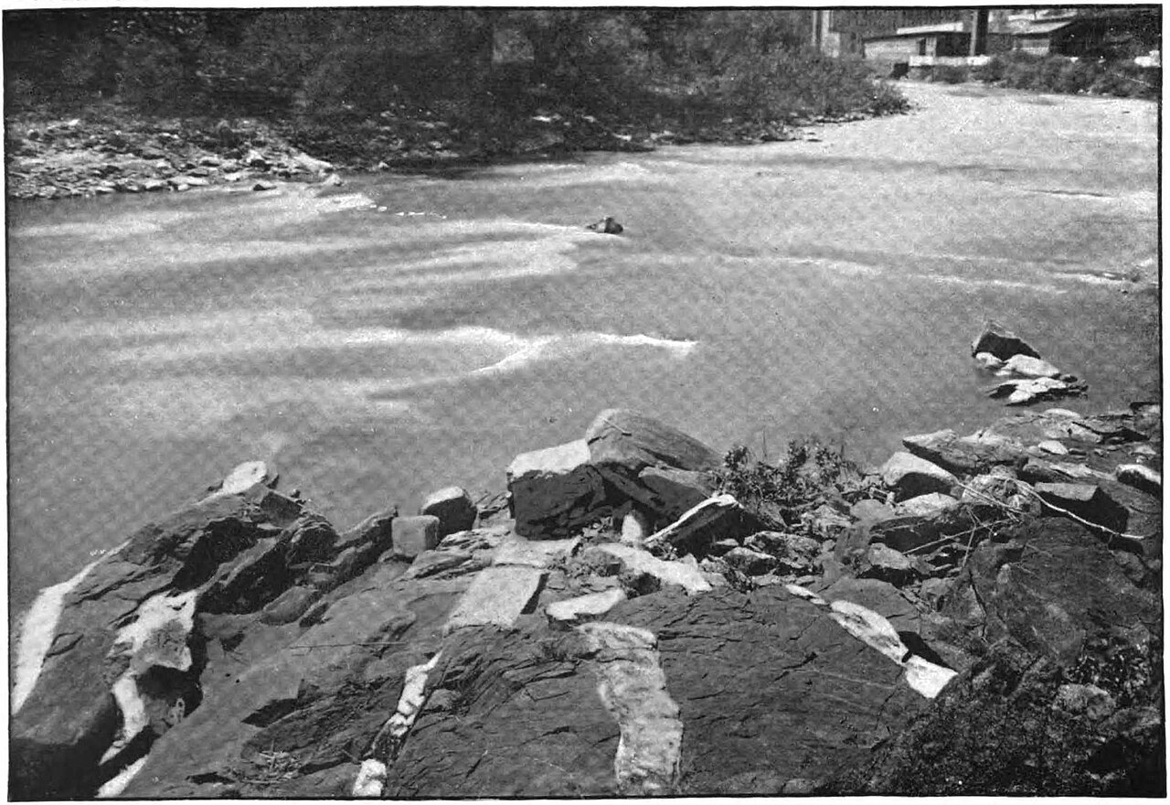 Plate XXXIII from The Origin and Relations of Central Maryland Granites (Extract from the 15th Annual Report of the U. S. Geologic Survey, 1893-94) by Charles Rollin Keyes, 1895.  Caption is "Pegmatite Dikes, Ilchester Station."  Ilchester Station is now simply called Ilchester.