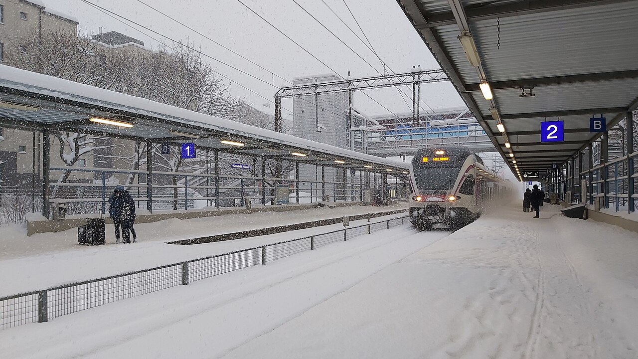 Train station in heavy snow.