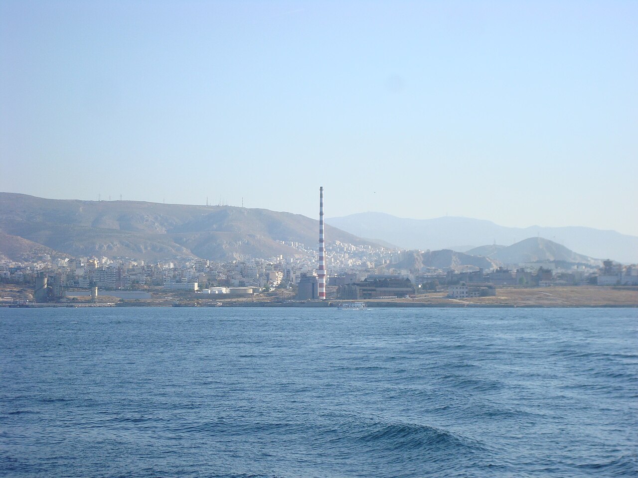 View of the chimneys of Keratsini electricity factory, in Piraeus, Greece