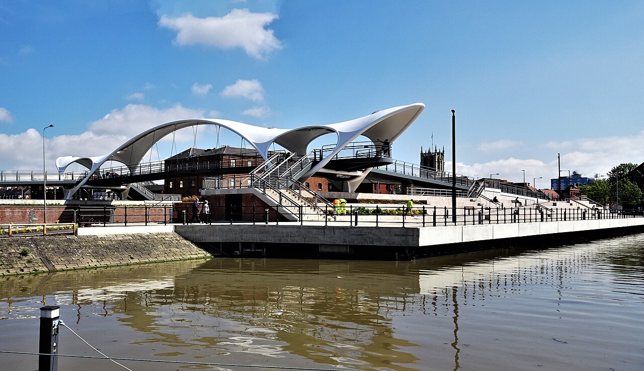 A spectacular footbridge to provide a better and safer pathway between the city centre and the waterfront and Fruit Market regeneration sites was opened to the general public for the first time on 1 March 2021. It was announced in September 2020 that the bridge was to be named 'Murdoch's Connection' after Dr Mary Murdoch, the city's first female G.P.
Landscaping is currently being undertaken on the north side of Humber Dock. Viewed from the west side of the Dock.