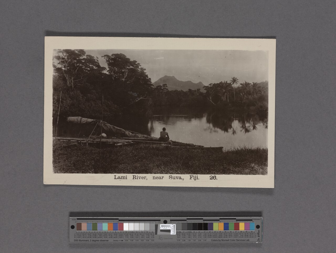 * Printed on verso: "Real photo postcard, British made.  Caine series, Suva, Fiji.  Copyright."