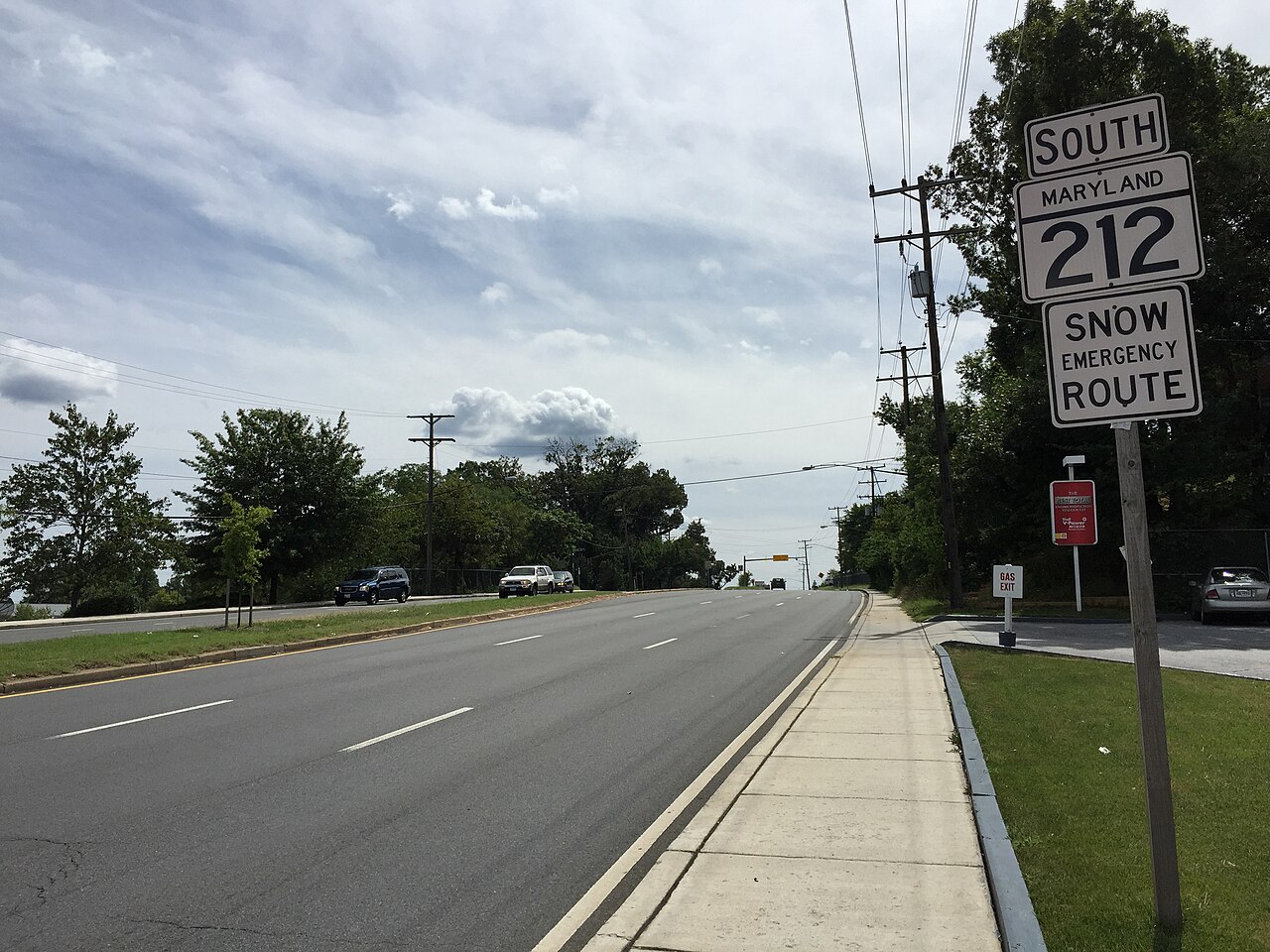 View south along Maryland State Route 212 (Riggs Road) at Maryland State Route 193 (University Boulevard) in Langley Park, Prince Georges County, Maryland