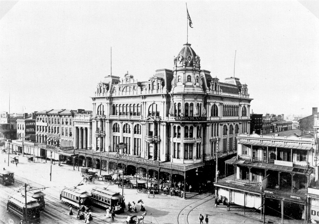 New Orleans: The old Maison Blanche Department Store building on Canal Street at Dauphine in 1898. Horse and carriage traffic visible on street, electric streetcars on the neutral ground.