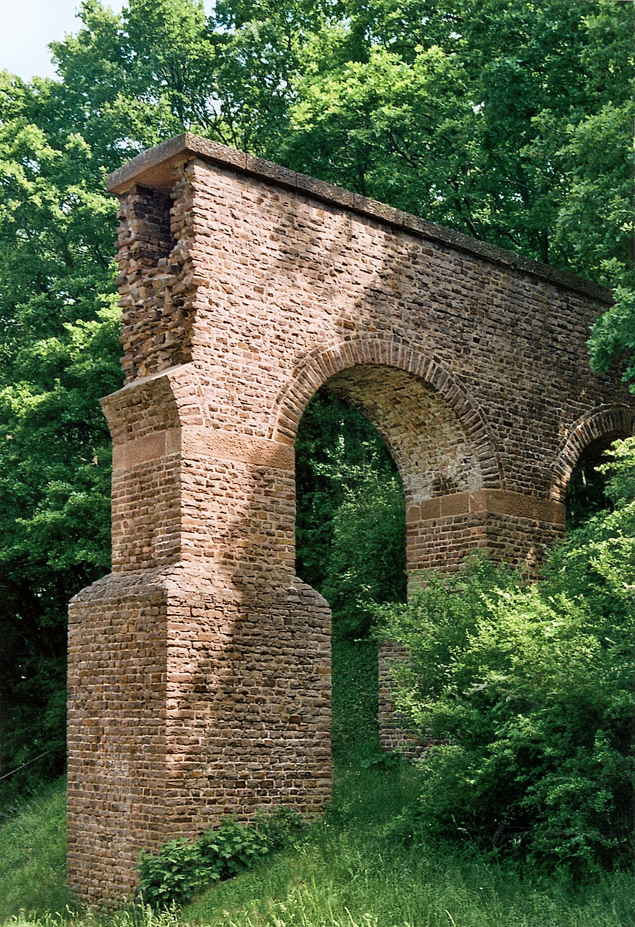 1961 reconstructed Roman Eifel aqueduct near Mechernich-Vussem, Germany.