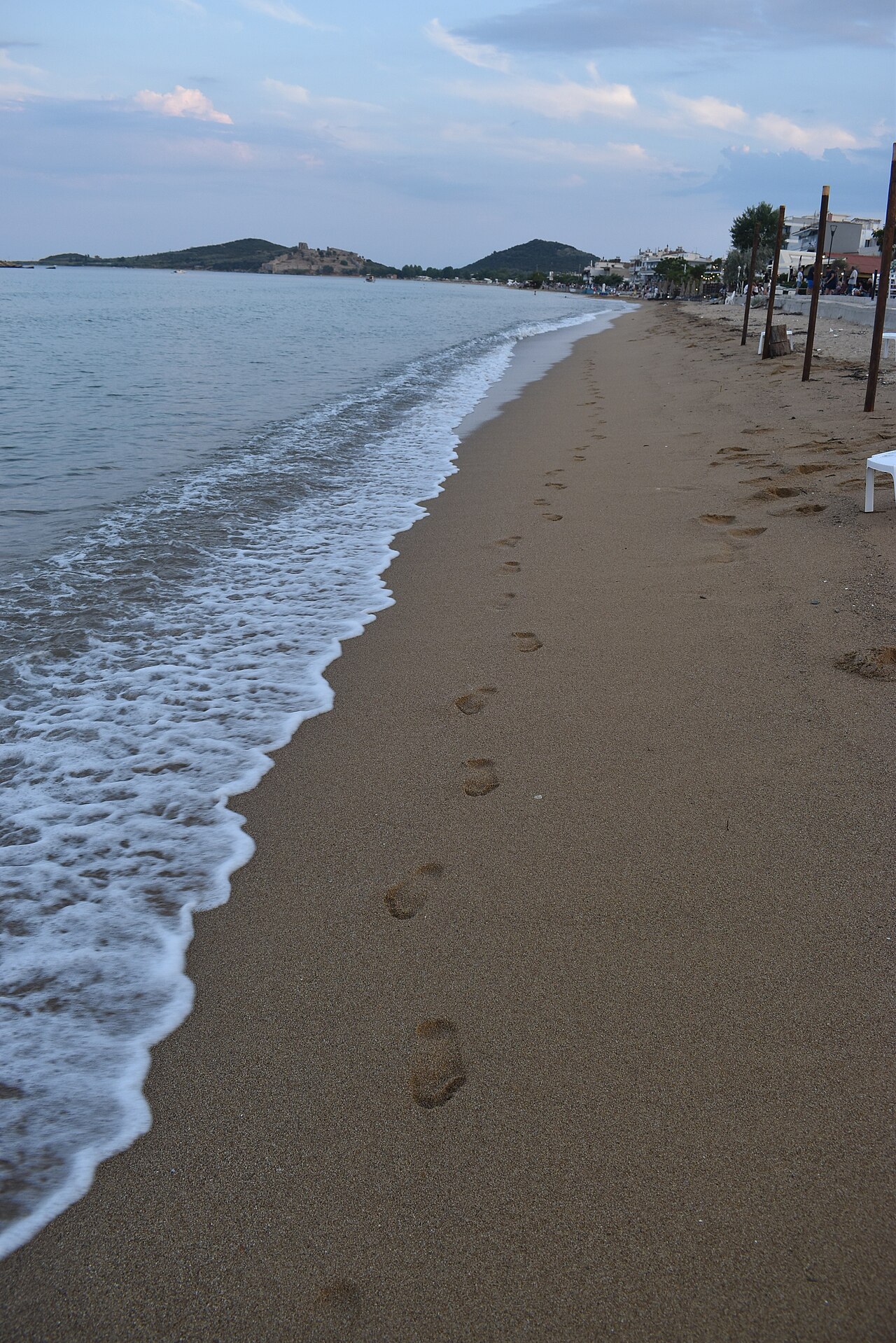 Footprints on the beach - Nea Peramos, Greece.