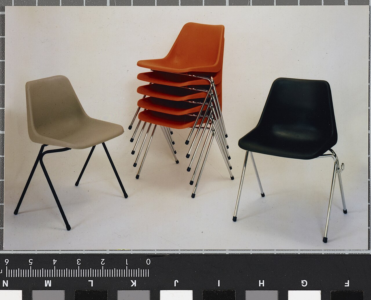 Polypropylene stacking chairs in original colours (charcoal, light grey and flame red), Robin Day, Hille, 1964