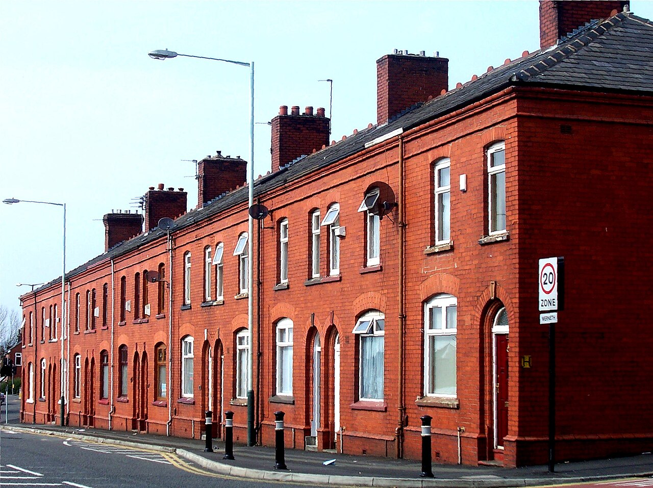 Fredrick Street, in the Werneth area of Oldham, Greater Manchester, England.

This fine Accrington brick terrace was originally the tied homes of the firemen operating from the long since demolished fire and police station at the end of the row - all that is, except the furthest one, which was the police sergeant's house with a side door into the police station. There is a similar terrace running at rightangles up the hill. the space behind the terraces was the practice yard.