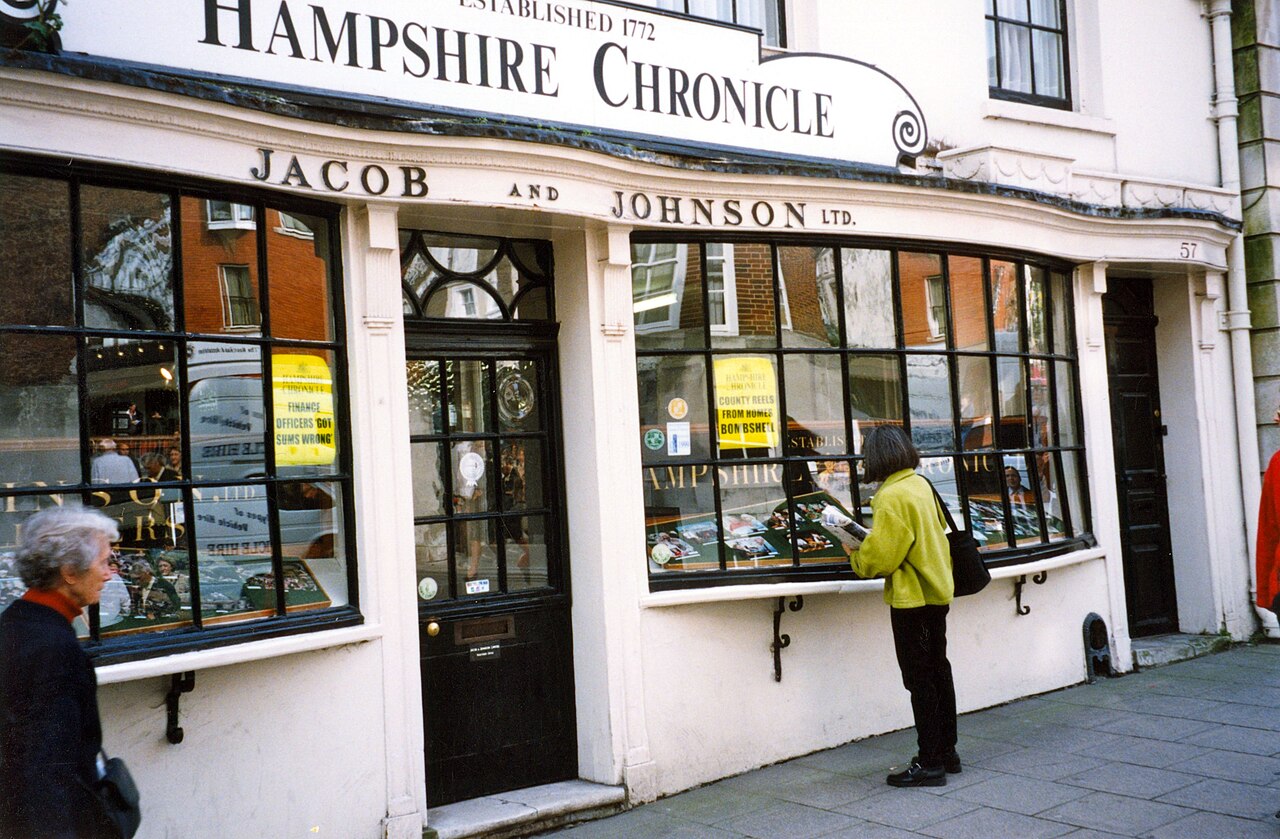 Woman looking in front window of Hampshire Chronicle newspaper, 1999.
Other information

Photo by George Garrigues.