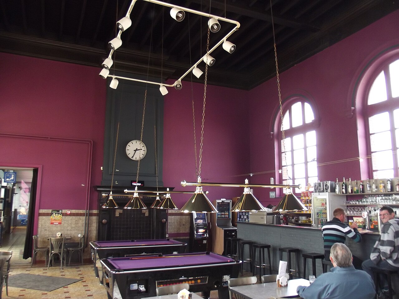 Café in the station with pool tables.