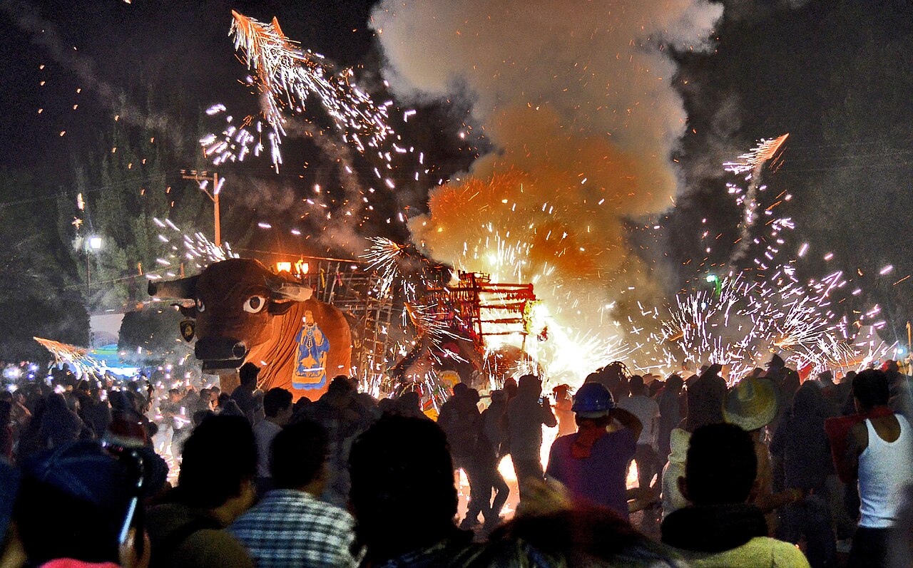 the "Burning of the Bulls." At the the event, which commemorates the feast of John of God (the patron saint of firework makers), locals build enormous bull-shaped floats out of papier