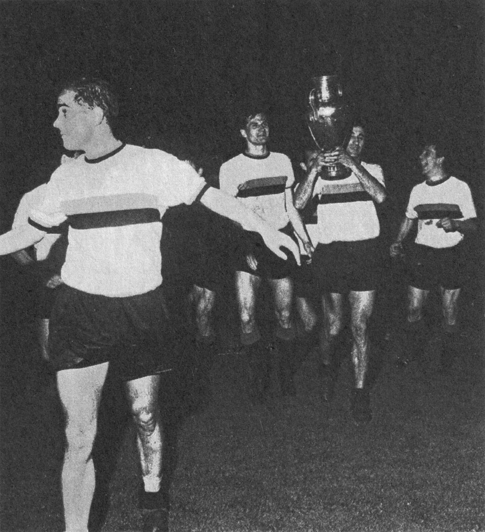 Milan (Italy), San Siro, May 27, 1965. From left to right: Inter Milan's footballers Luis "Luisito" Suárez Miramontes, Giacinto Facchetti, Joaquín Peiró Lucas and Gianfranco Bedin with the trophy of the 1964–65 European Cup at the end of the victorious final versus S.L. Benfica (1-0).