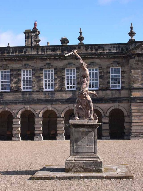 Sculpture, Seaton Delaval Hall This sculpture, presumably of two figures from Classical mythology giving each other a hard time, stands in the courtyard of Seaton Delaval Hall, designed by Sir John Vanbrugh and built in 1718-1728 . The east wing can be seen beyond.
