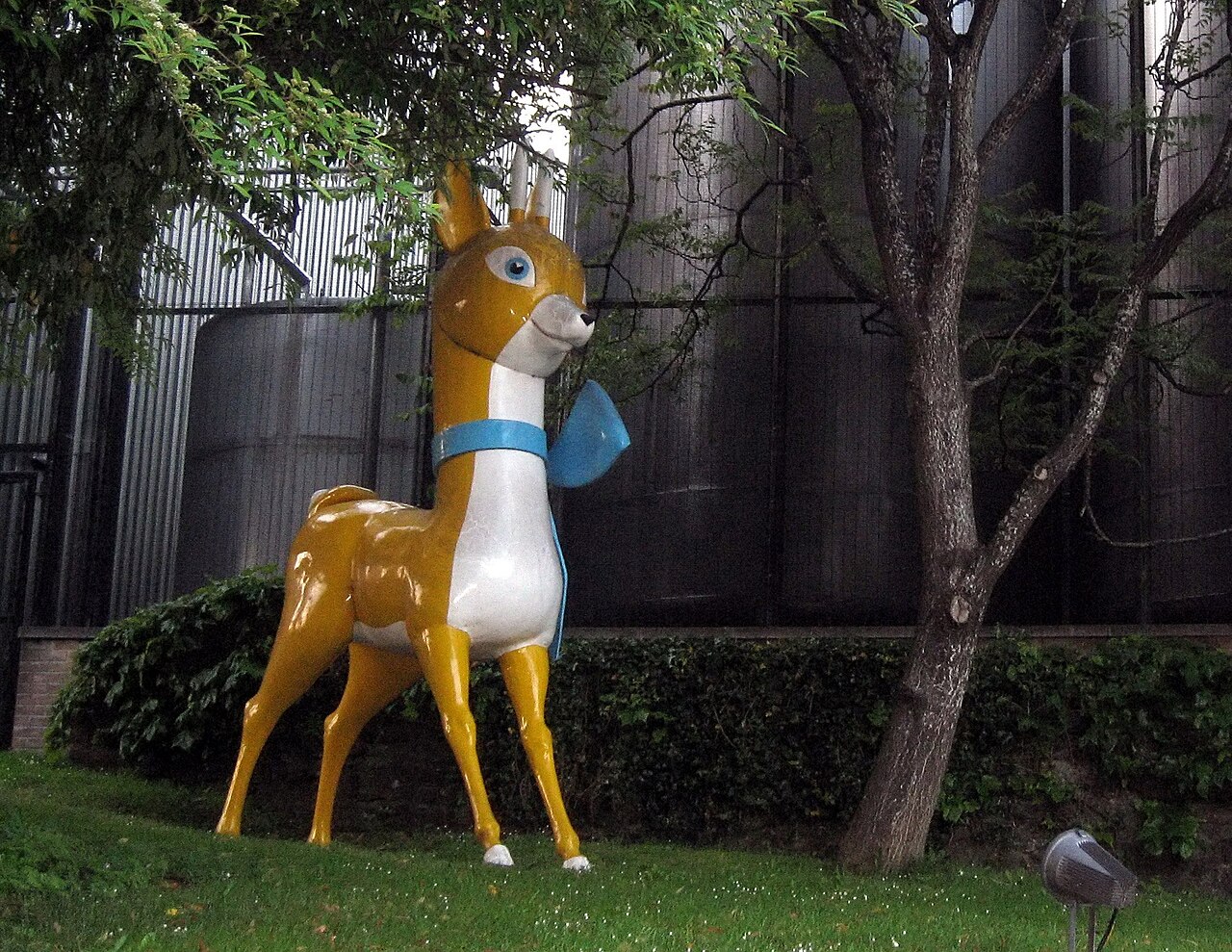 This fawn, the trademark for Babycham sparkling perry, is outside the Shepton Mallet, Somerset, UK factory where it is produced. The drink, an early ready-mixed drink aimed with pioneering marketing at women, was invented by Shepton drinksmaker Francis Showering in the 1950s, and is now owned by Constellation Brands. The figure was once on the roof of the factory but now faces the passing traffic at road level.