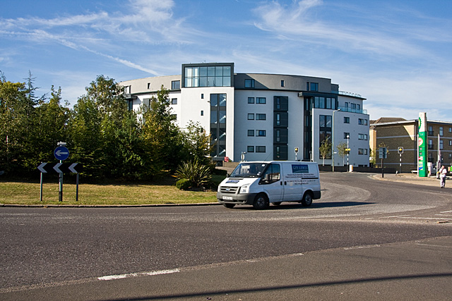 Betstyle Circus Taking its name from the village that existed in this area, nowadays it is part of New Southgate.
A transit van hurtles around the roundabout - it's a popular racetrack.  Behind, a new apartment block has been completed (I'll add the name when I've had time to confirm it).