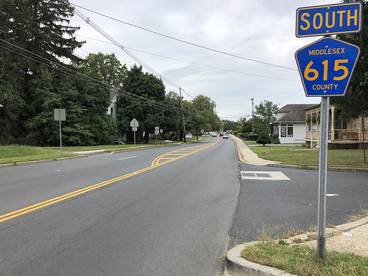View south along Middlesex County Route 615 (Main Street) at Summerhill Road (Middlesex County Route 613) in Spotswood, Middlesex County, New Jersey