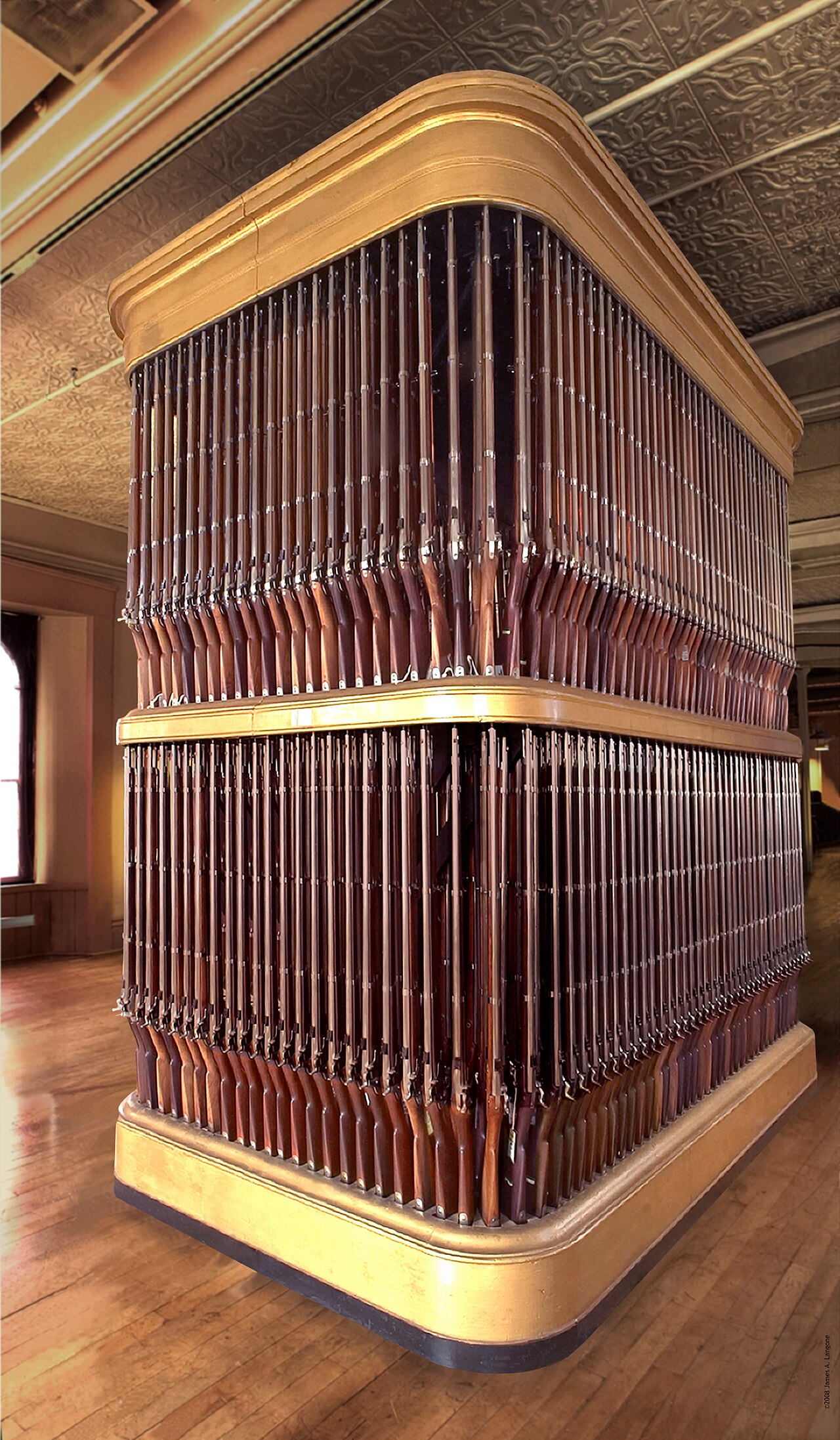 The "Organ of Muskets", one of several racks constructed by craftsmen during the 1830s, so-named for the protest it inspired from Henry Wadsworth Longfellow, who lamented the wastes of war.