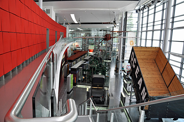 Exhibition Hall, National Waterfront Museum - Swansea An impressive building with this gallery, one of several, concentrating on engineering and featuring early Welsh inventions.
Elsewhere commentators have expressed disappointment with the museum and in particular the current trait of concentrating on electronic information displays at the expense of items on display. I have to say I agree as apart from three other adults this hall with few visual aids was almost empty. In an upper gallery children dashed from control unit to control unit and screen to screen without appearing to absorb anything they were looking at. Though alternative efforts to draw the public into them museums are to be applauded it would seem that they have been turned into amusement arcades.