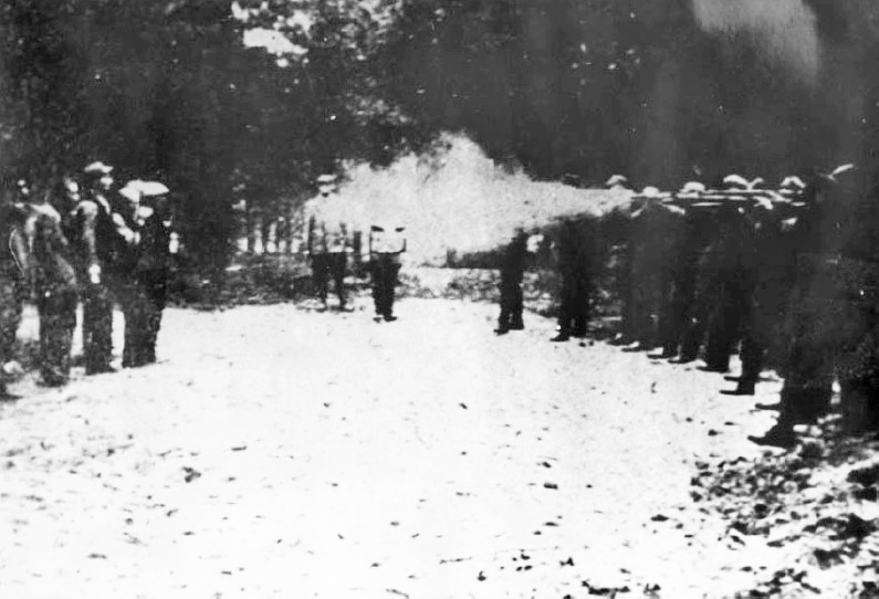 Mass execution in Barbarka forest near German-occupied Toruń. In autumn 1939 approximately 600 Poles were executed in this place by the members of paramilitary Volksdeutscher Selbstschutz. During the Second World War this photo was placed in so-called "Album of fame of Selbstschutz" (known also as "Alvensleben Album"). After the end of war this album was found and taken over by the Polish authorities.