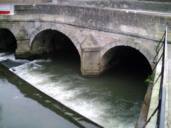 The River Biss flowing under the old town bridge in Trowbridge, Wiltshire, UK