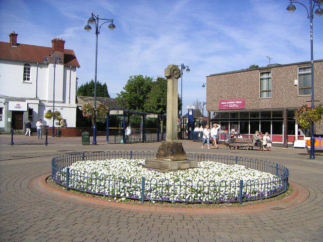 Wath upon-Dearne Town Centre. Wath Market Cross is in the foreground.
In 1312 King Edward II granted permission for an annual market and fair.

In 1989 the cross was given a new shaft.